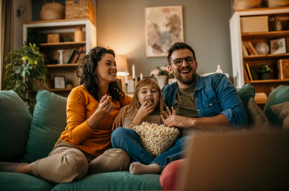 family in living room warm and comfy
